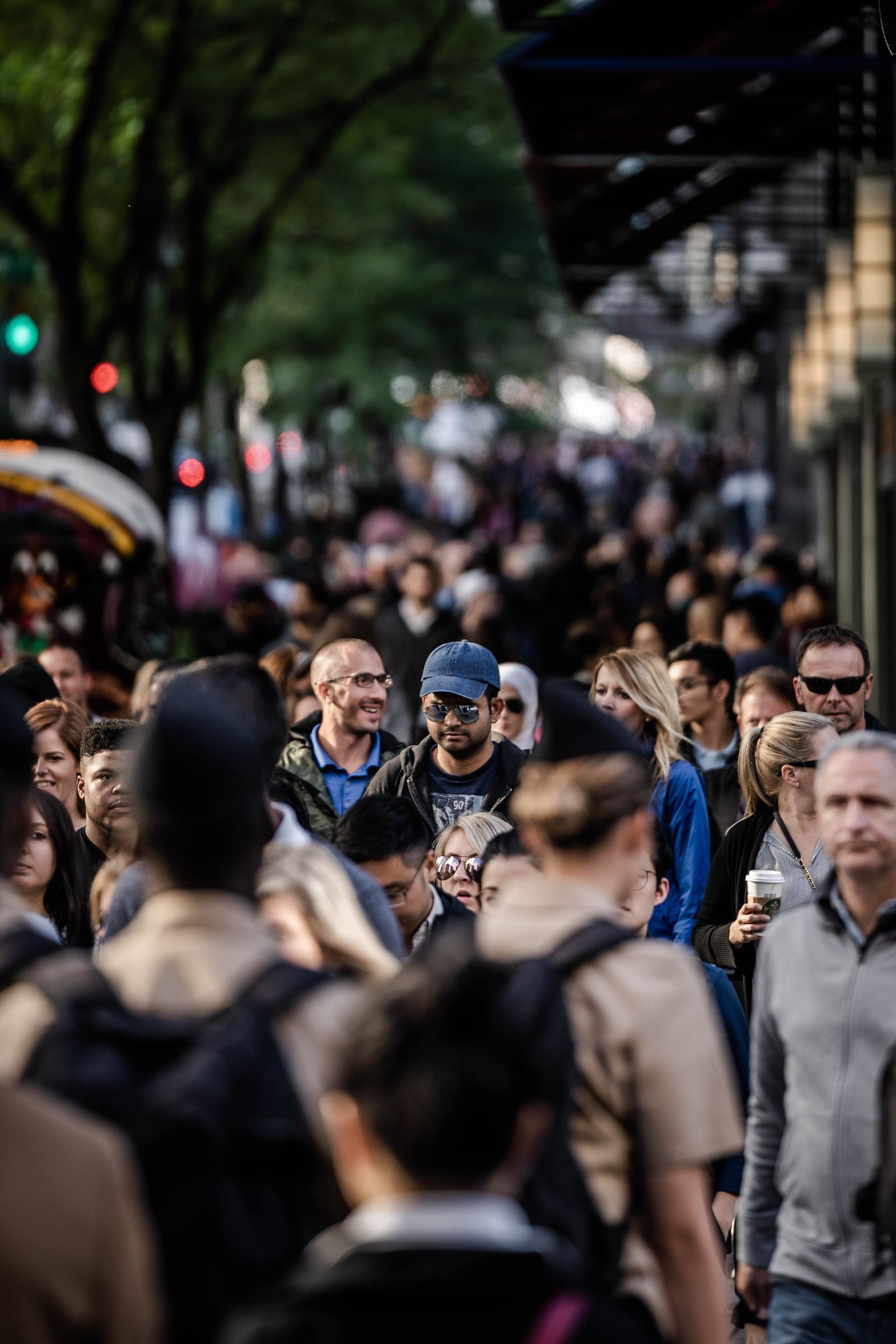 Pedestrians crossing a busy city street